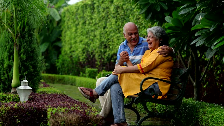 Happy retired couple enjoying financial freedom